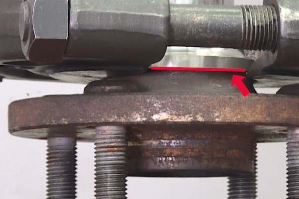 Wheel Bearing Replacement - Insert a separator into the gap between the end face of the inner ring and the wheel hub.